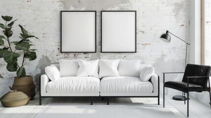Living room furnished with a white sofa and black armchair, featuring blank posters on the wall