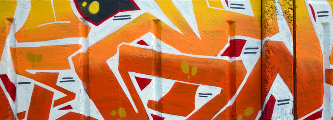 Colorful background of graffiti painting artwork with bright aerosol outlines on wall. Old school...
