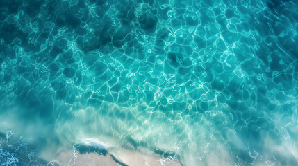 top view at a Calm clear blue sea water background. Blue azure sea water texture.top view