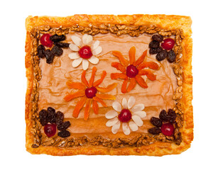 Top view of kaymak cake decorated with dried or candied fruits and walnuts isolated on white background - 751897391