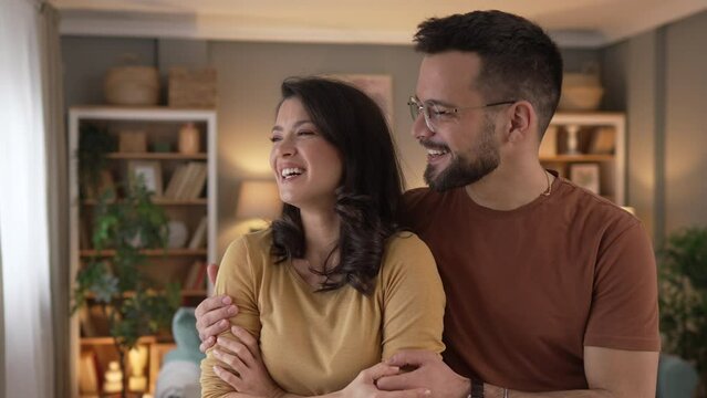 Happy adult caucasian couple at home husband and wife family concept