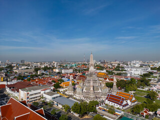 Pagoda at Wat Arun buddhist Temple of dawn a tourist landmark with Chao Phra Ya river aerial view - 751920554