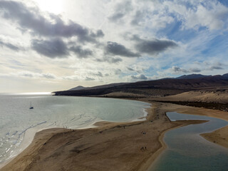 Aerial view on sandy dunes and turquoise water of Sotavento beach, Costa Calma, Fuerteventura, Canary islands, Spain in winter