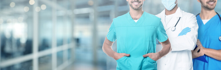 Doctors and nurse in hospital, closeup. Banner design with space for text
