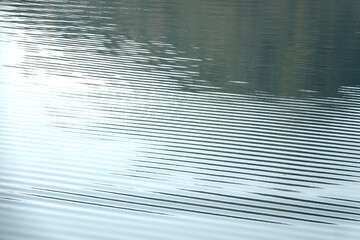 View of the ripples and reflection on the lake in the morning
