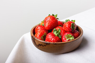 Strawberries in wooden bowl