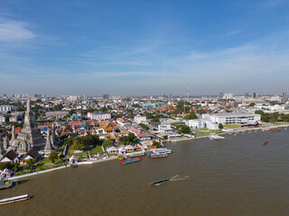 Pagoda at Wat Arun buddhist Temple of dawn a tourist landmark with Chao Phra Ya river aerial view - 751923590