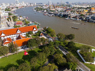 Pagoda at Wat Arun buddhist Temple of dawn a tourist landmark with Chao Phra Ya river aerial view - 751923592