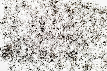 Chaotic traces of black paint on a white paper canvas. Blank for design, graphic resource