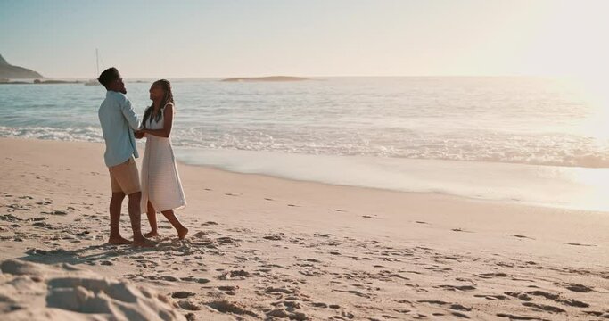Couple, dancing and together at beach for vacation with bonding, love and care with holding hands. People, African man and black woman with dancer, partner and moving on holiday for connection by sea