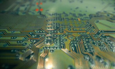 Electronic circuit board with semiconductors chip. Electronic motherboard card. Circuitry and close-up on electronics. Background of electronics on board electrical circuits, technology texture.