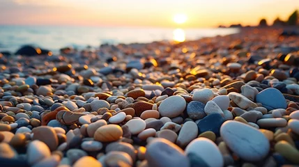 Fotobehang Stenen in het zand Pebble stones on the shore