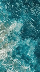 Fototapeta na wymiar Blue sea water texture background. Top view of the sea surface.