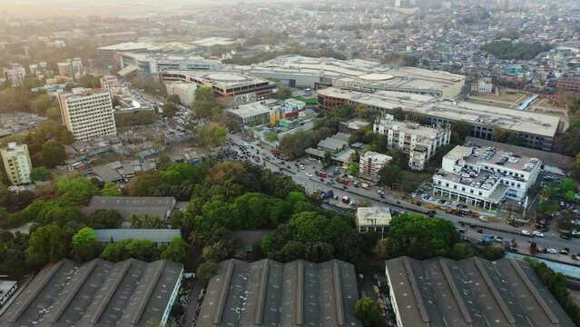 Aerial view around traffic at a mall in Dharavi, sunset in Mumba city, India