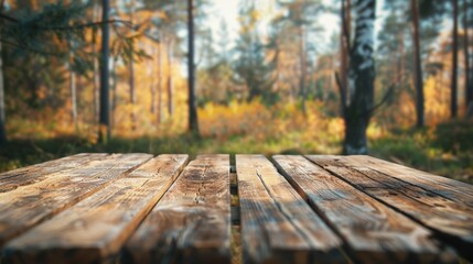Naklejka na ściany i meble Beautiful blurry boreal forest background view. with empty rustic wooden table