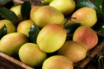 fresh ripe pears on wooden table.
