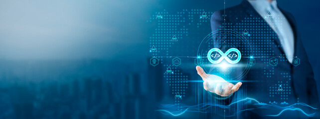 DevOps: Businessman Holding DevOps on Global Technology Network, Automation, Collaboration,...