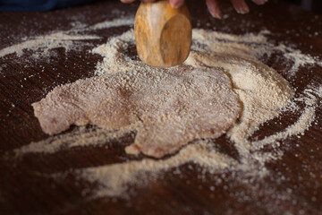 Photography of chicken milanesa preparation. Food preparation concept.