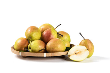 ripe pear fruit with half and slices isolated on white background