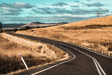 The view of the winding highway in regional Tasmania in autumn