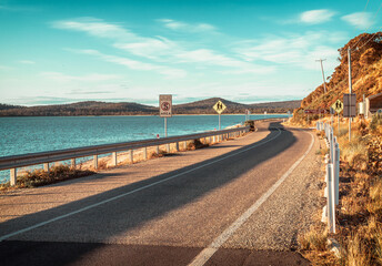 Fototapeta na wymiar The view of the coastal driveway/highway in the Bruny Island in Tasmania at dusk