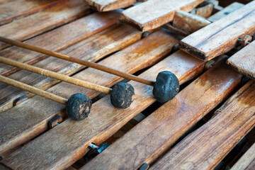 A close up of an old marimba