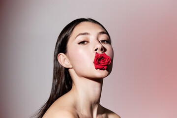 Elegant Beauty: Pretty Caucasian Woman with a Perfect Rose Make-up, Radiating Sensuality and...