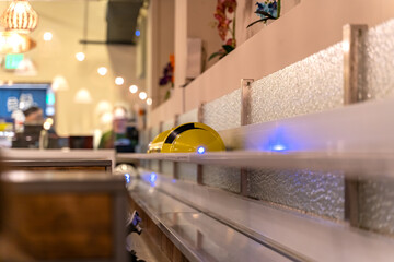 Automated food delivery in a restaurant. High speed ​​sushi train and food delivery system. 