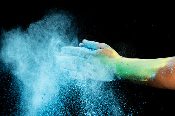 Human hand with colorful Holi powder