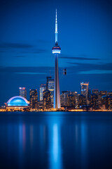 Magnificence Of The CN Tower: A Marvelous Piece Of Architecture Against The Backdrop Of Toronto Cityscape