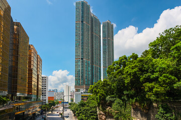 The Victoria Towers along Canton Road, Hong Kong, China. Triple high-rise residential complex at the edge of Kowloon Park. - obrazy, fototapety, plakaty