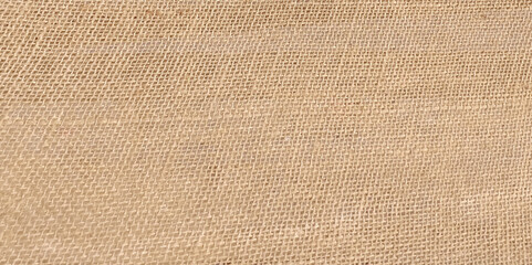 Cream abstract Hessian or sackcloth fabric or hemp sack texture background. Wallpaper of artistic wale linen canvas. Blanket or Curtain of cotton pattern with space for text decoration.
