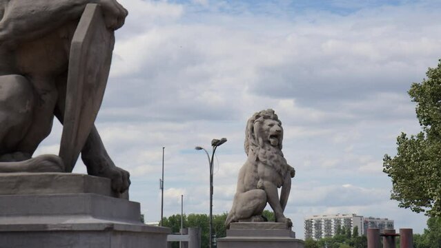 A Stone Lion Sculpture Positioned Close to the Scheldt River in Antwerp, Belgium - Medium Shot
