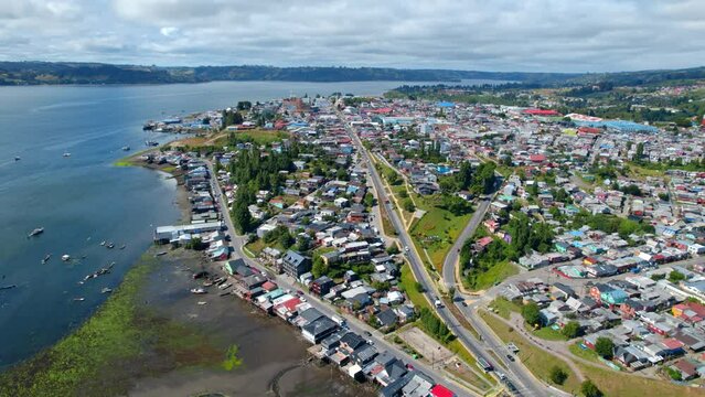 Aerial overview of the cityscape of Castro city, sunny day in Chiloe, Chile