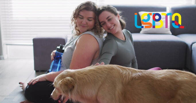 Image of rainbow lgbtq of lesbian couple petting dog at home