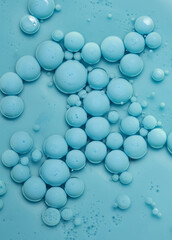 Blue floating bubbles. Acrylic paint. Abstract background.