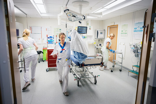 Female nurses working in operating room at hospital
