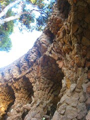 Arcade of masonry stone columns in Park Guell of Gaudi modernism in Barcelona, Spain