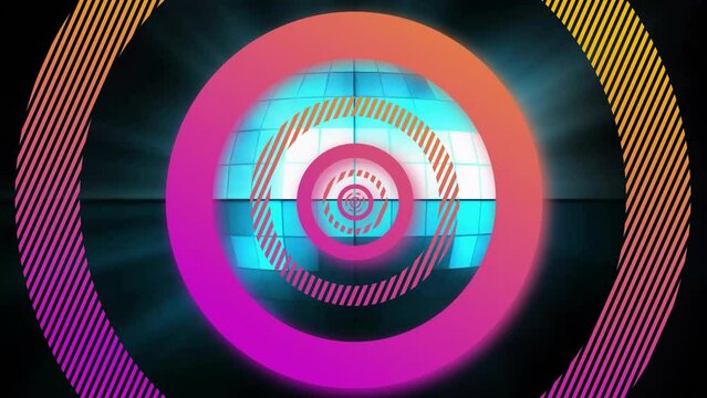 Animation of pink and orange concentric data loading rings processing over mirror ball