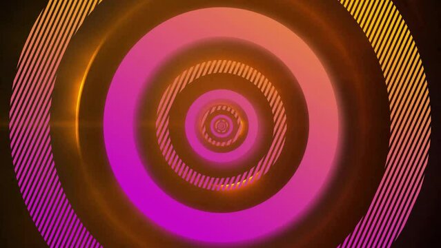 Animation of pink and orange concentric data loading rings processing over orange lights