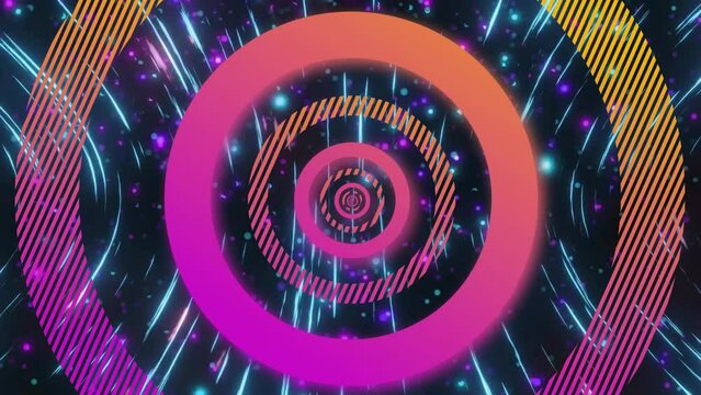 Animation of pink and orange concentric data loading rings processing over swirling lights