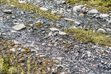 A stream of clear mountain water in the Fan Mountains in Tajikistan
