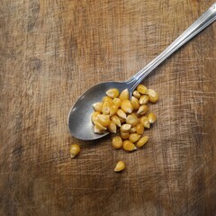 chickpeas in a wooden spoon