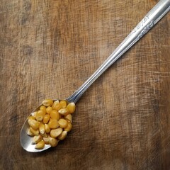 chickpeas in a wooden spoon