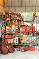 Hose and fire extinguishing equipment are placed on a hose rack.