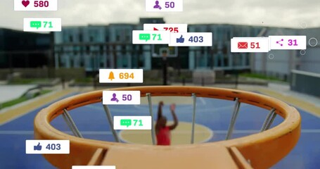 Animation of icons and data processing over african american male basketball player - Powered by Adobe