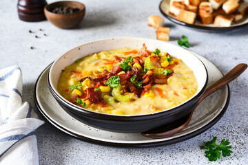 .Corn soup with vegetables and bacon