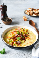 .Corn soup with vegetables and bacon