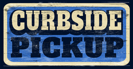 Aged and worn curbside pickup sign on wood