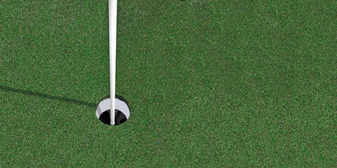 Close-up horizontal color photo looking down into an empty golf cup hole. Copy space.